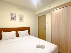 Spacious and Homey Apartment 2BR at Meikarta By Travelio